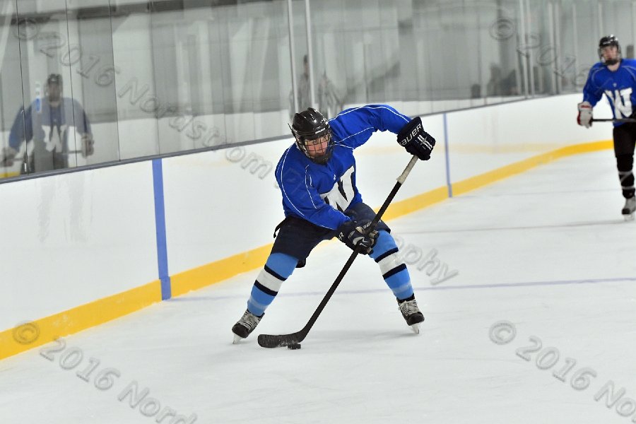 Wheaton College Men\'s Ice Hockey vs Middlesex Community College. - Photo By: KEITH NORDSTROM